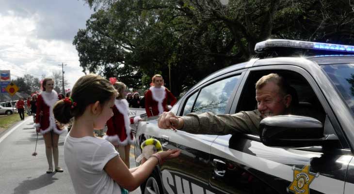 Mike Ezell Handing out Treats to Children